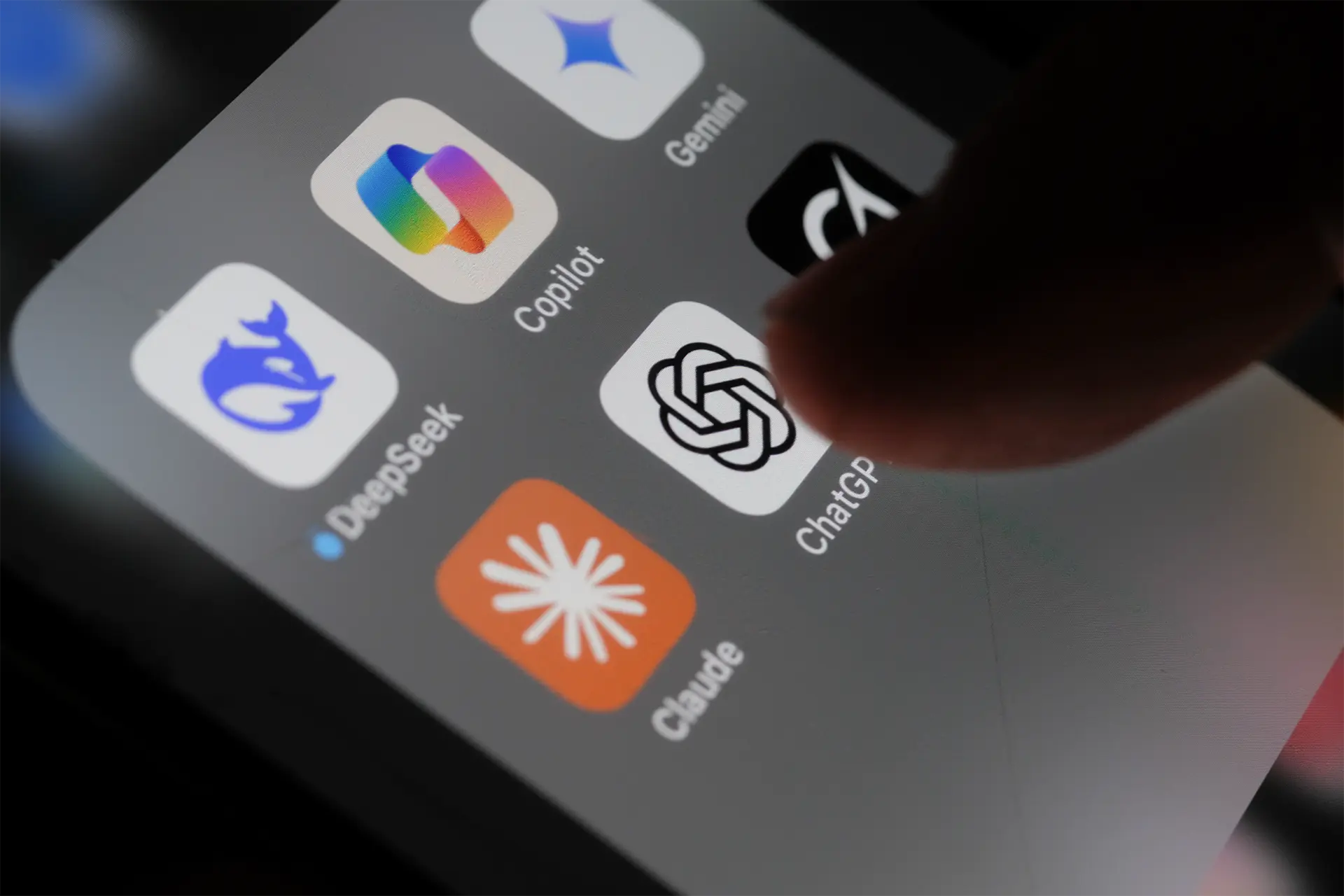 A phone screen showing icons for generative AI apps