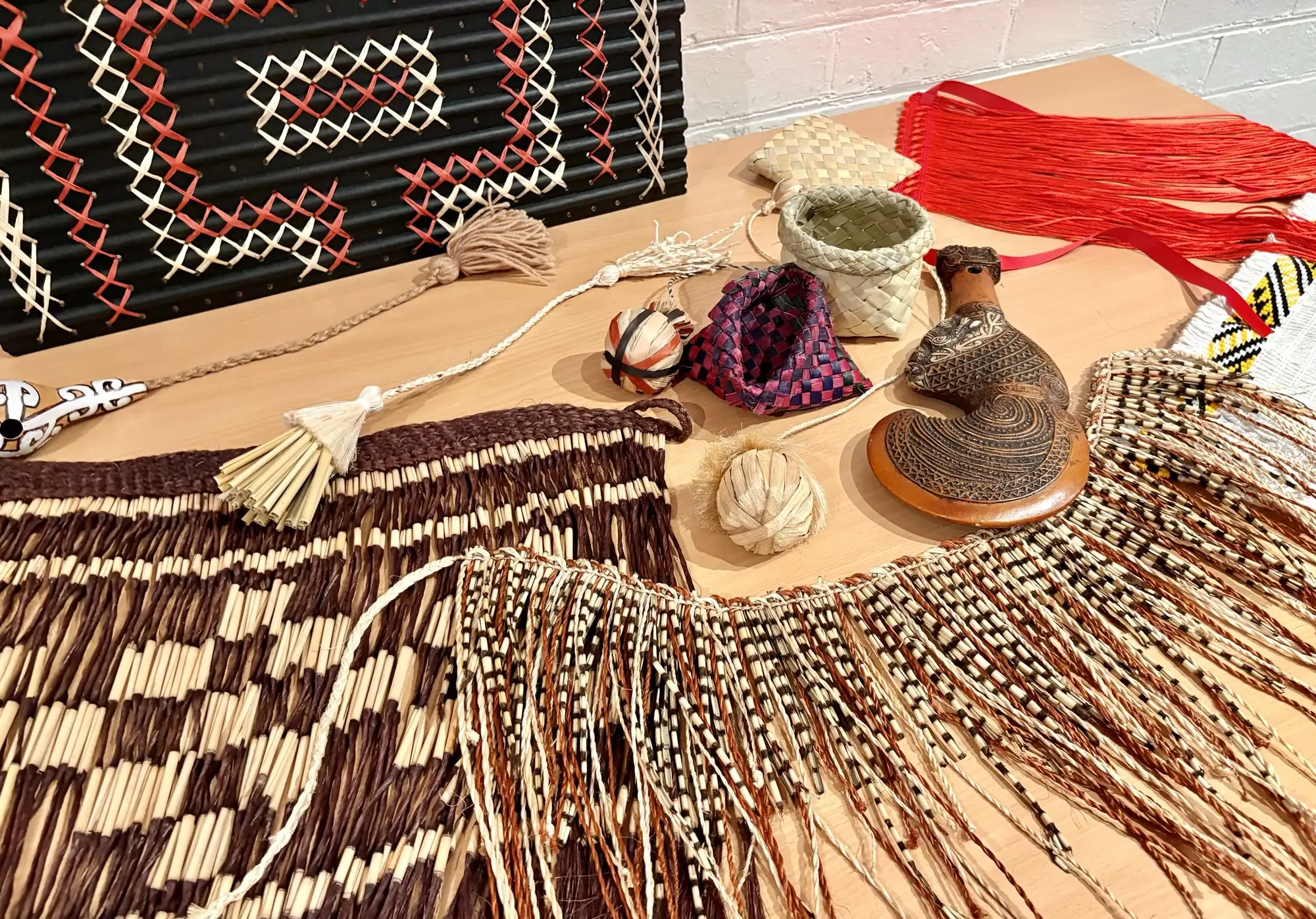 Pacific objects on a table in the Grainger Museum