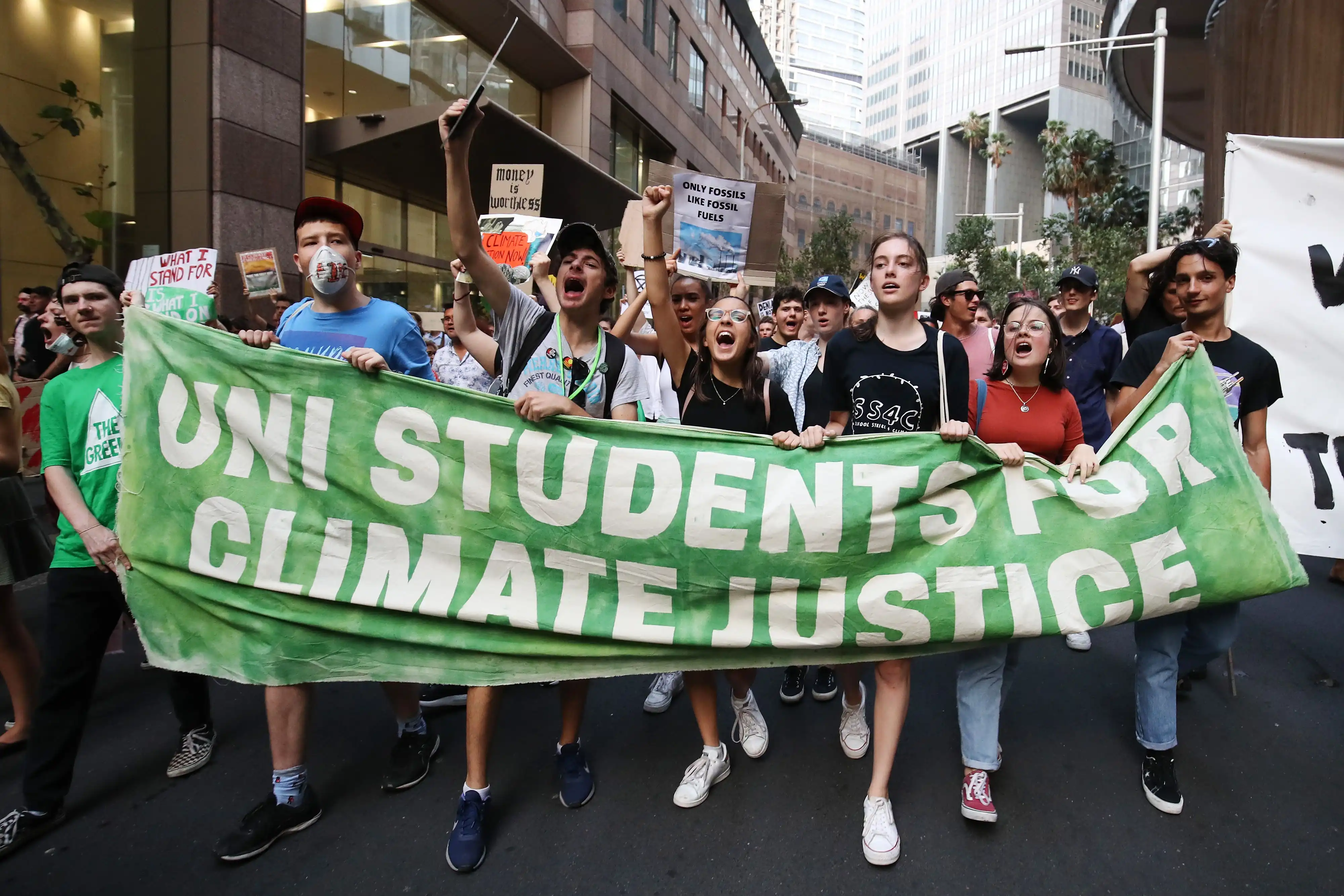 University students marching in a protest for climate justice