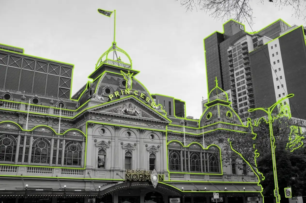A black-and-white photo of Melbourne Princes Theatre outlined in lime green
