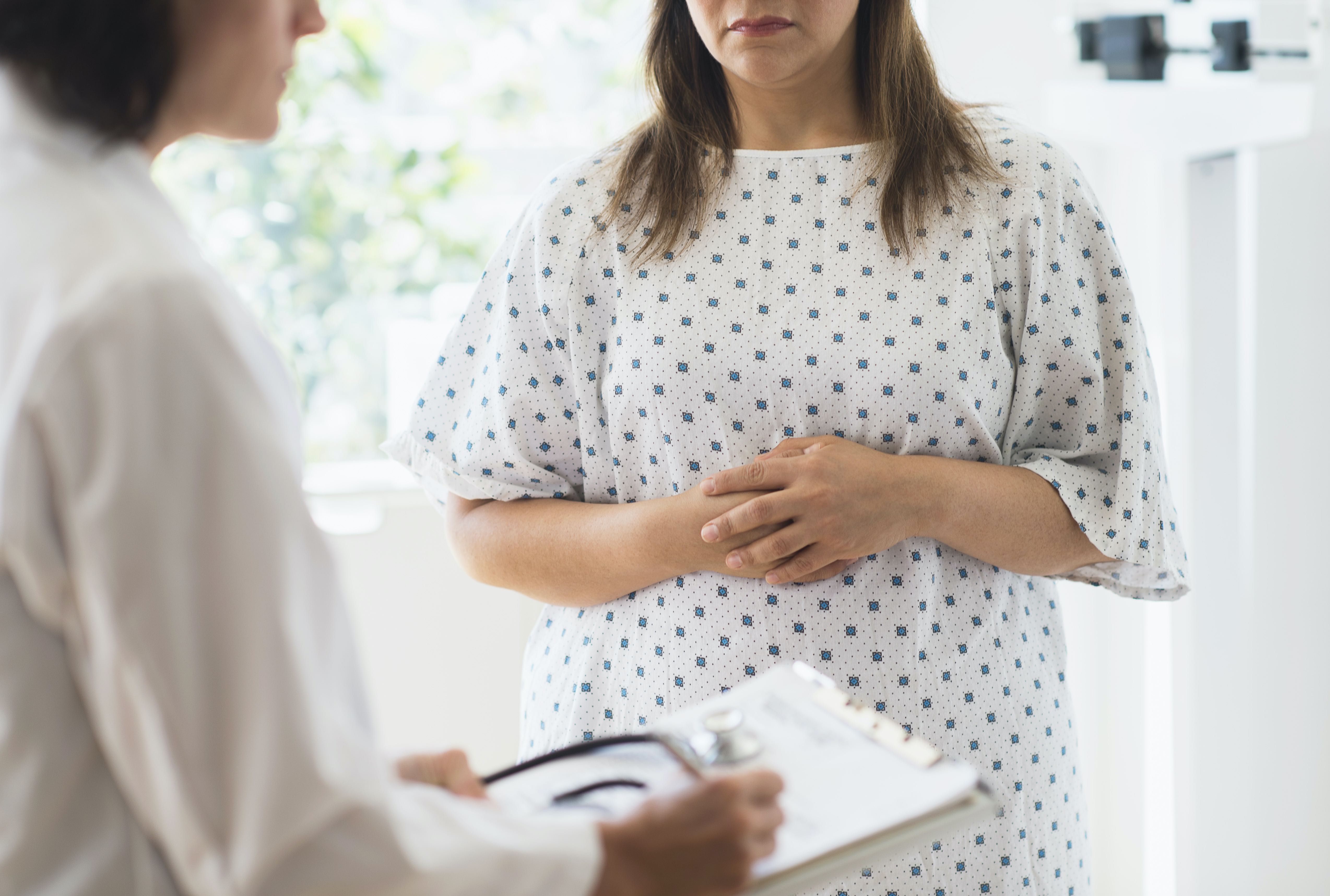 A woman talking to a doctor about her weight