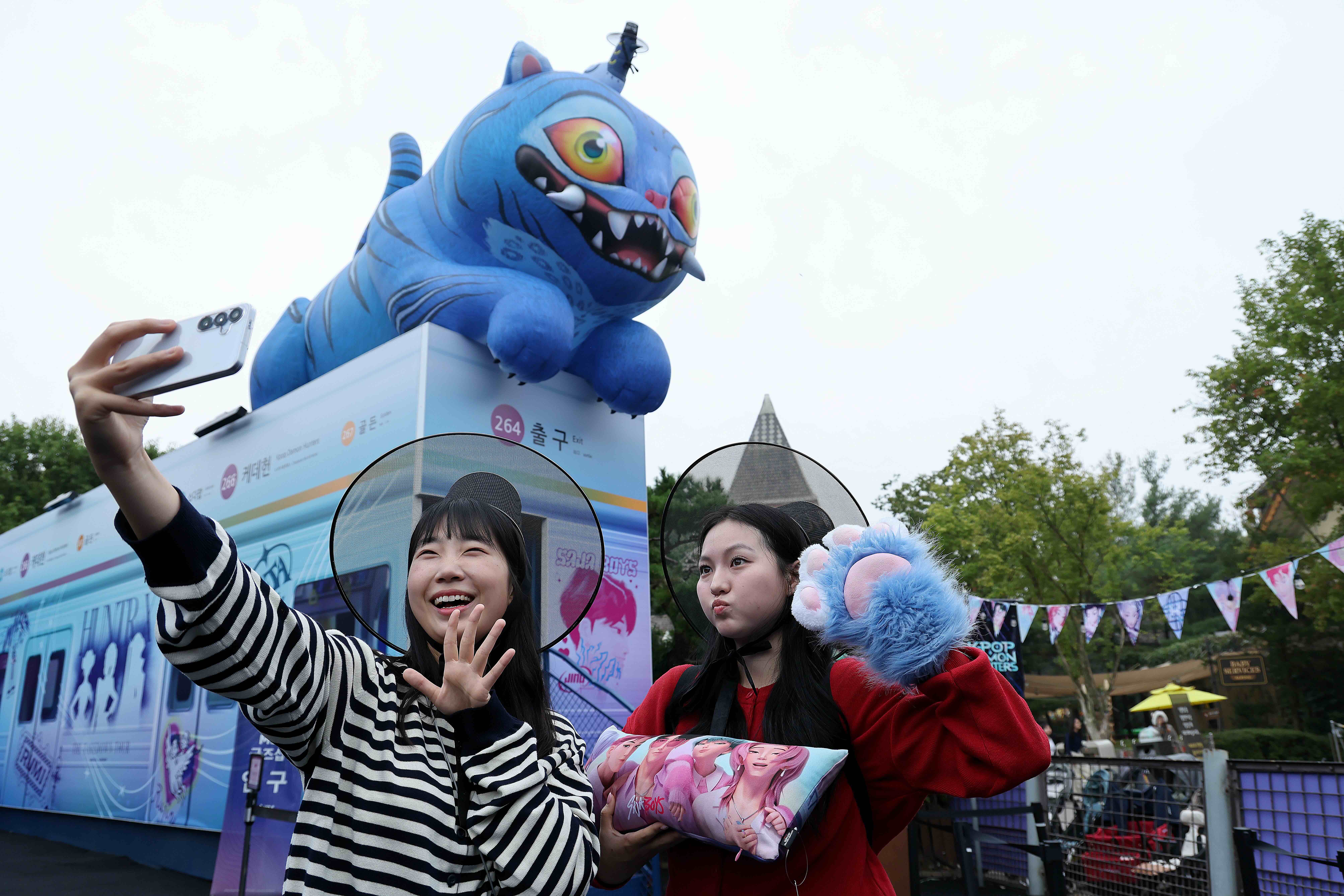 Fans at the KPop Demon hunters themed park Everland