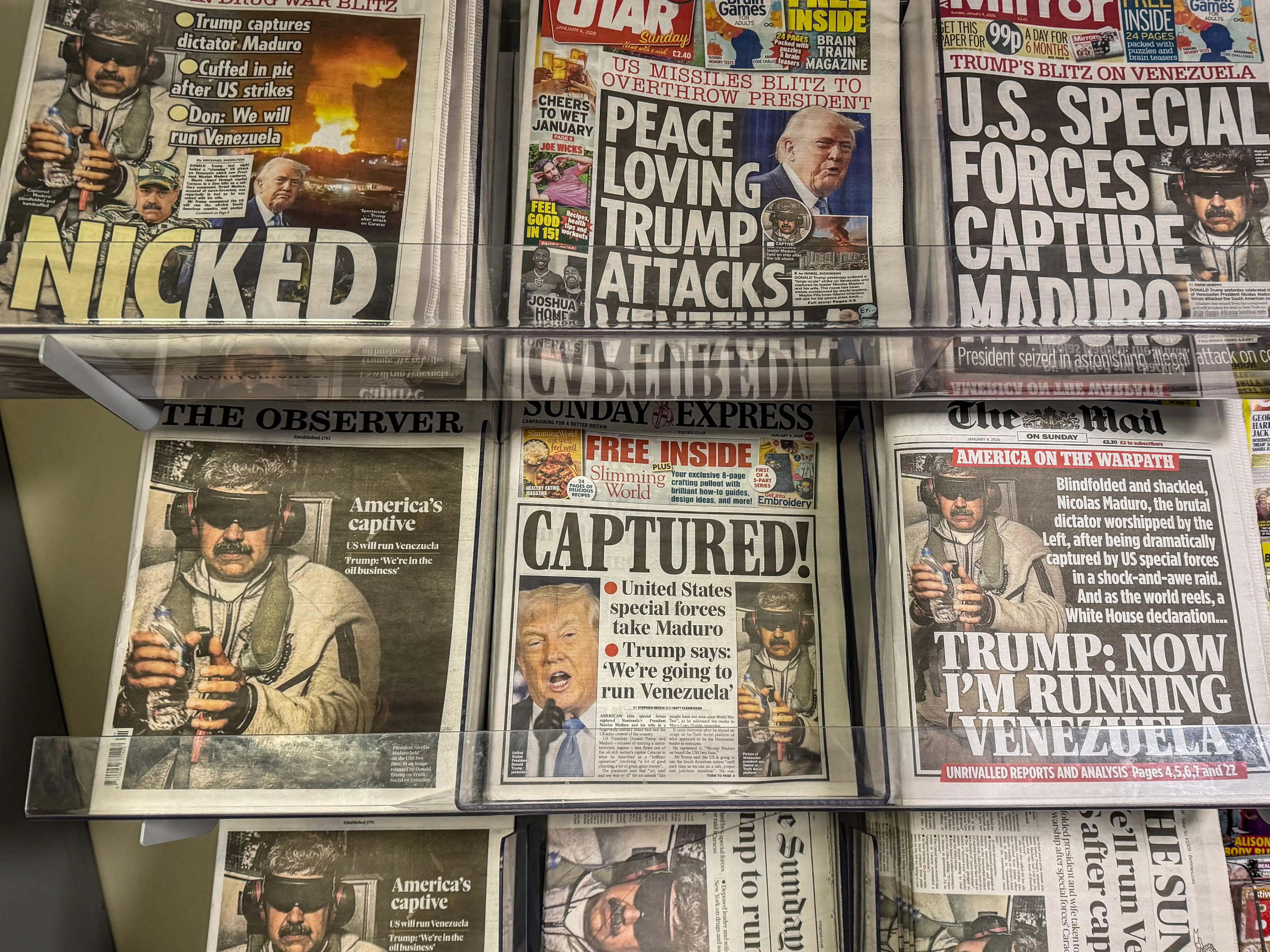 UK newspaper front pages display stories on the capture of President Nicolas Maduro