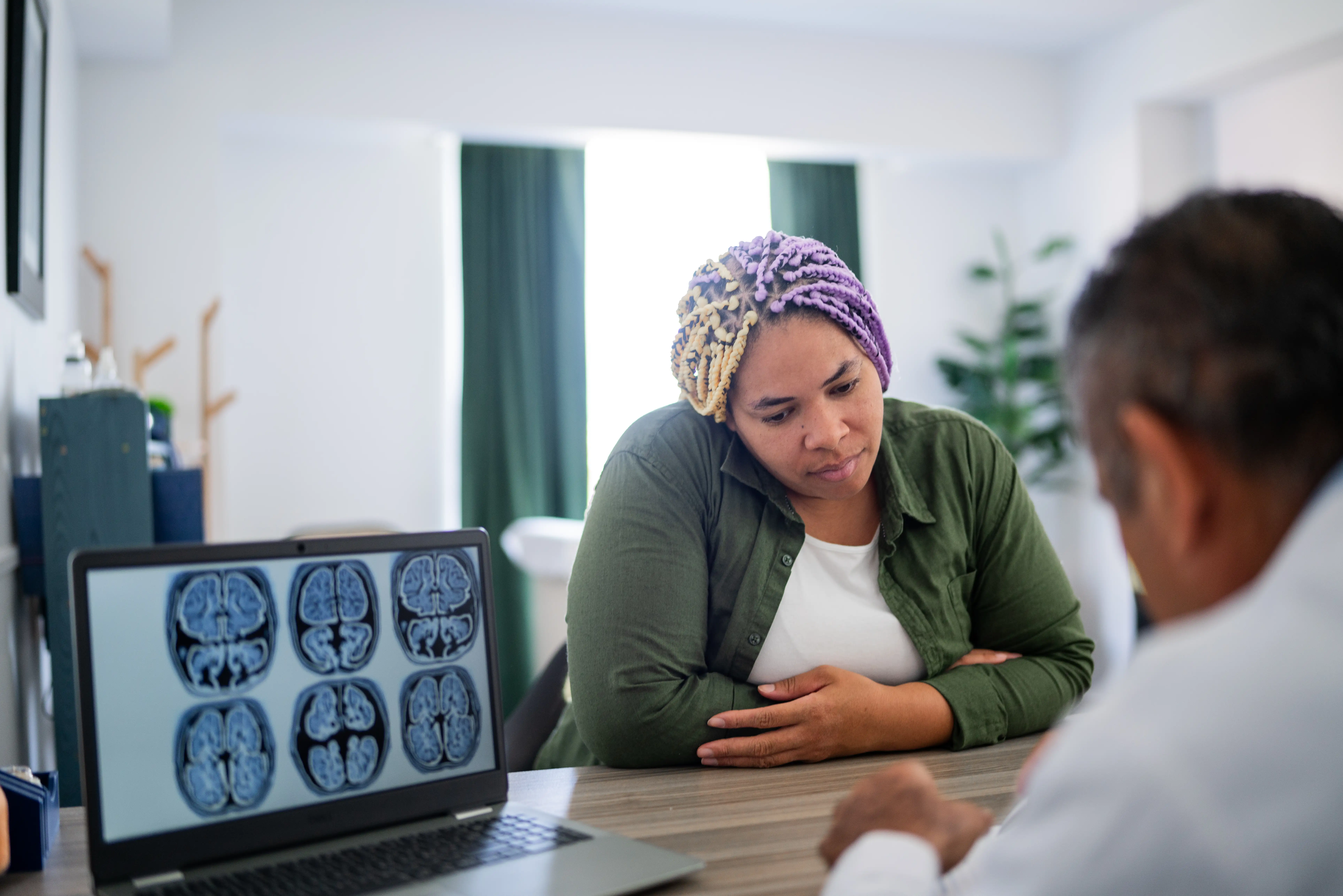 A woman in a consultation with a neurologist