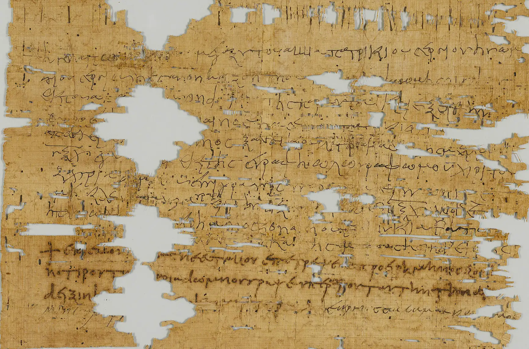 A pane of glass containing one papyrus fragment