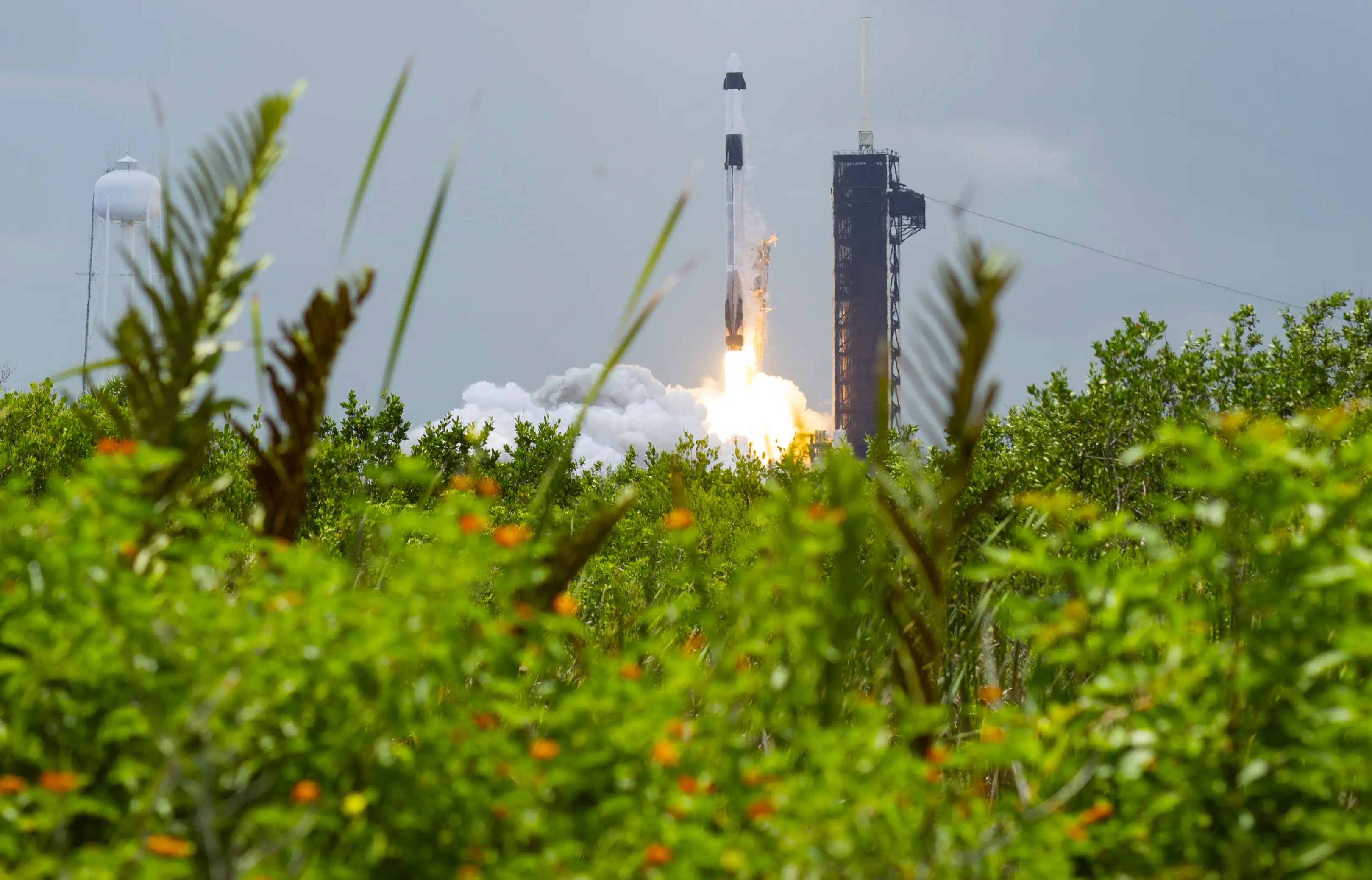 A SpaceX Falcon 9 rocket carrying the company’s Dragon spacecraft from Cape Canaveral