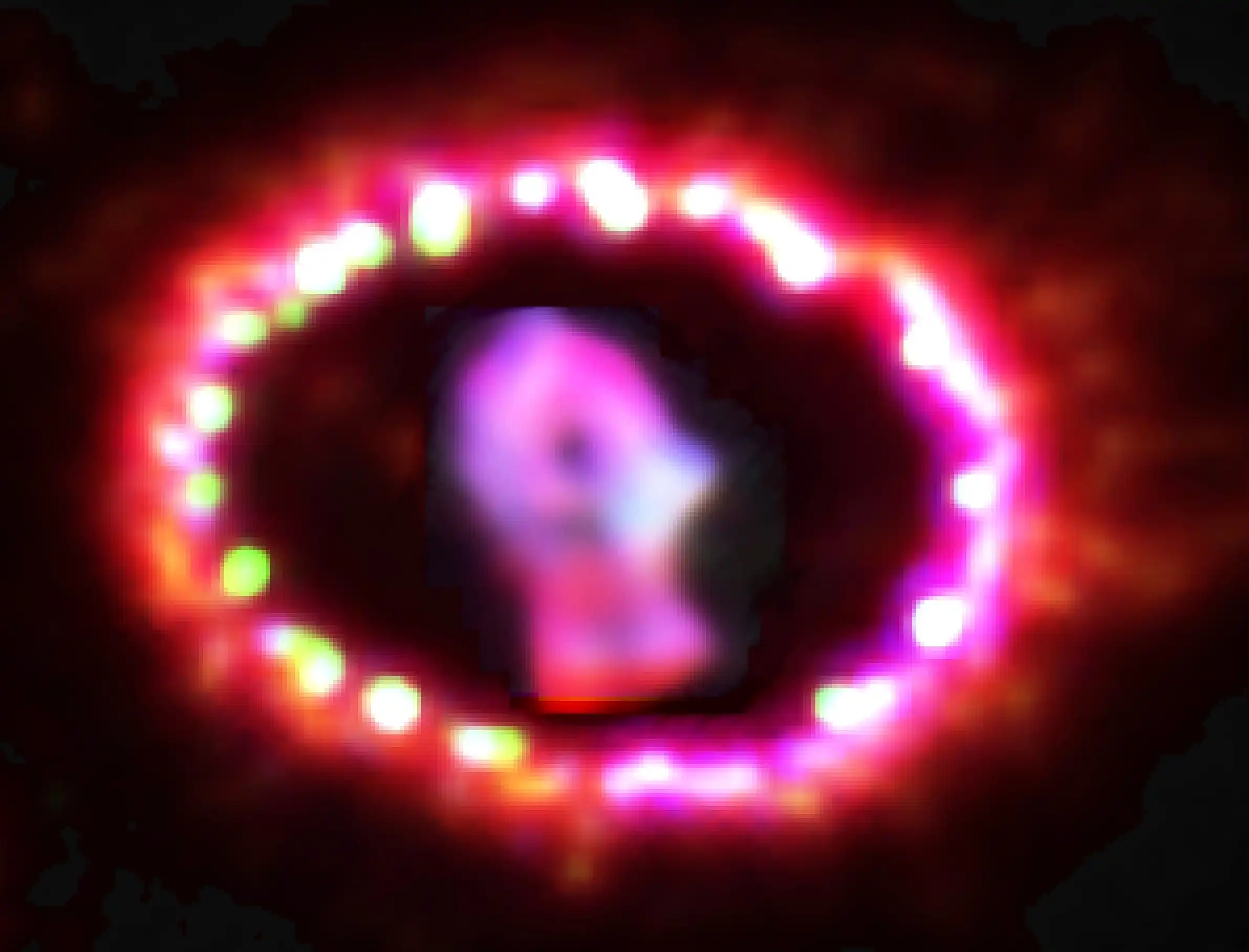 Kepler's supernova shown in an infrared image as a red circle with a dotted red ring around it