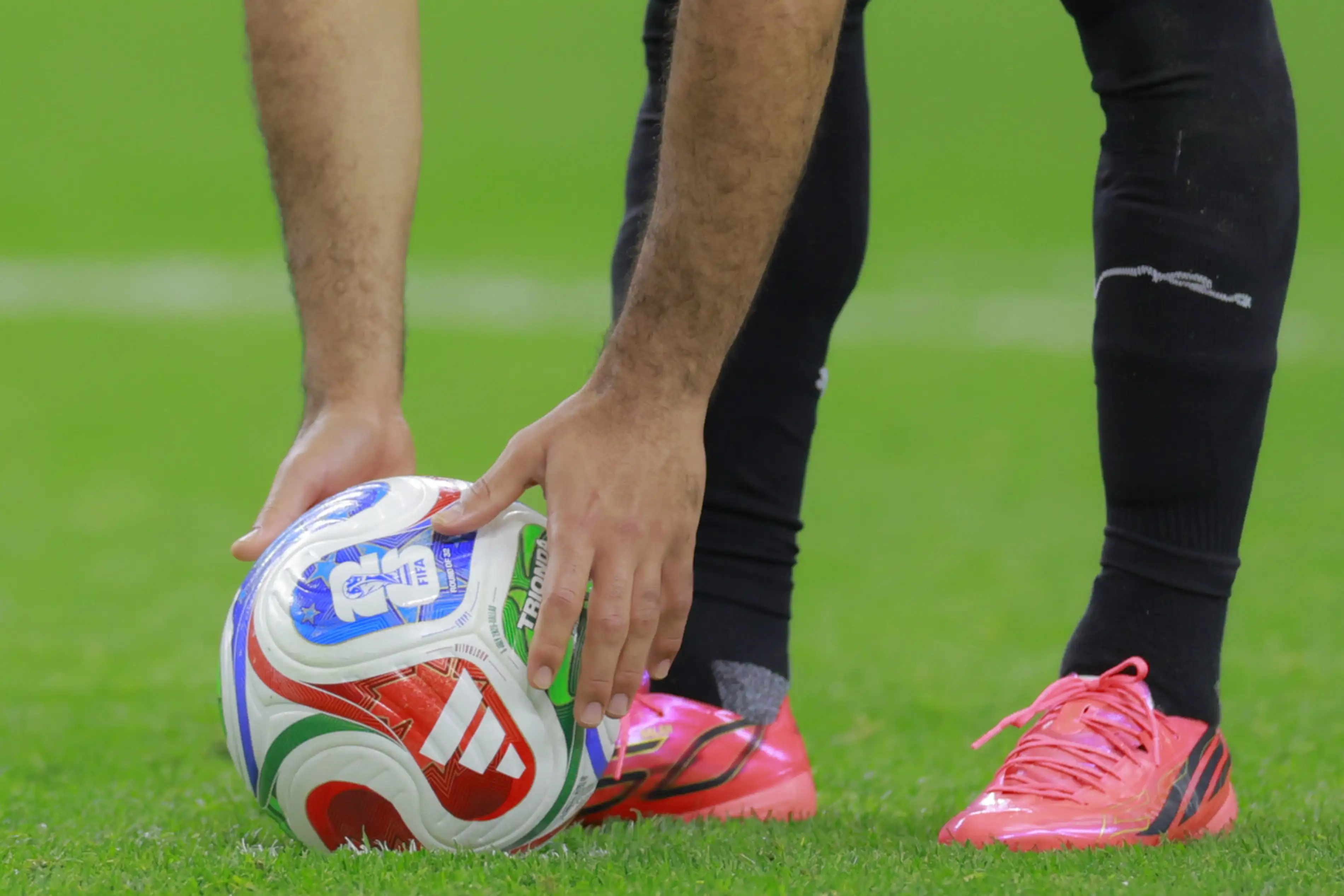 Mohamed Salah of Egypt positions the ball for the third penalty kick