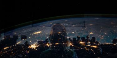 Composite of Earth from space and a crowd of people