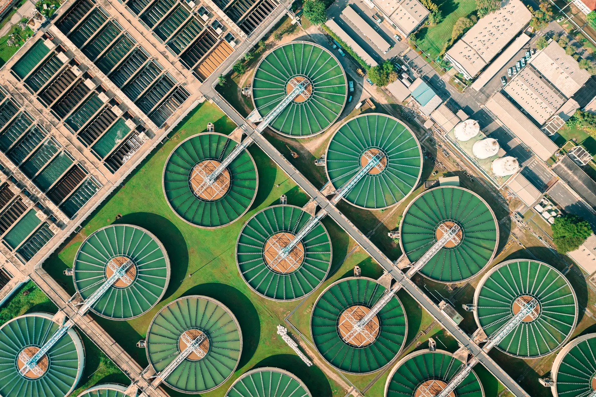 Looking down on rows of large circular tanks