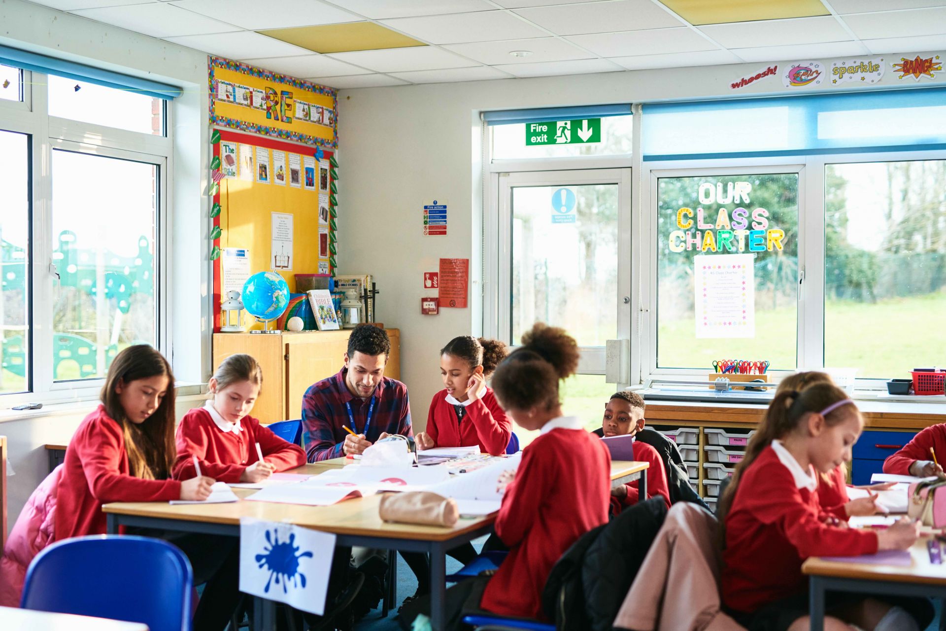 Male teacher in classroom