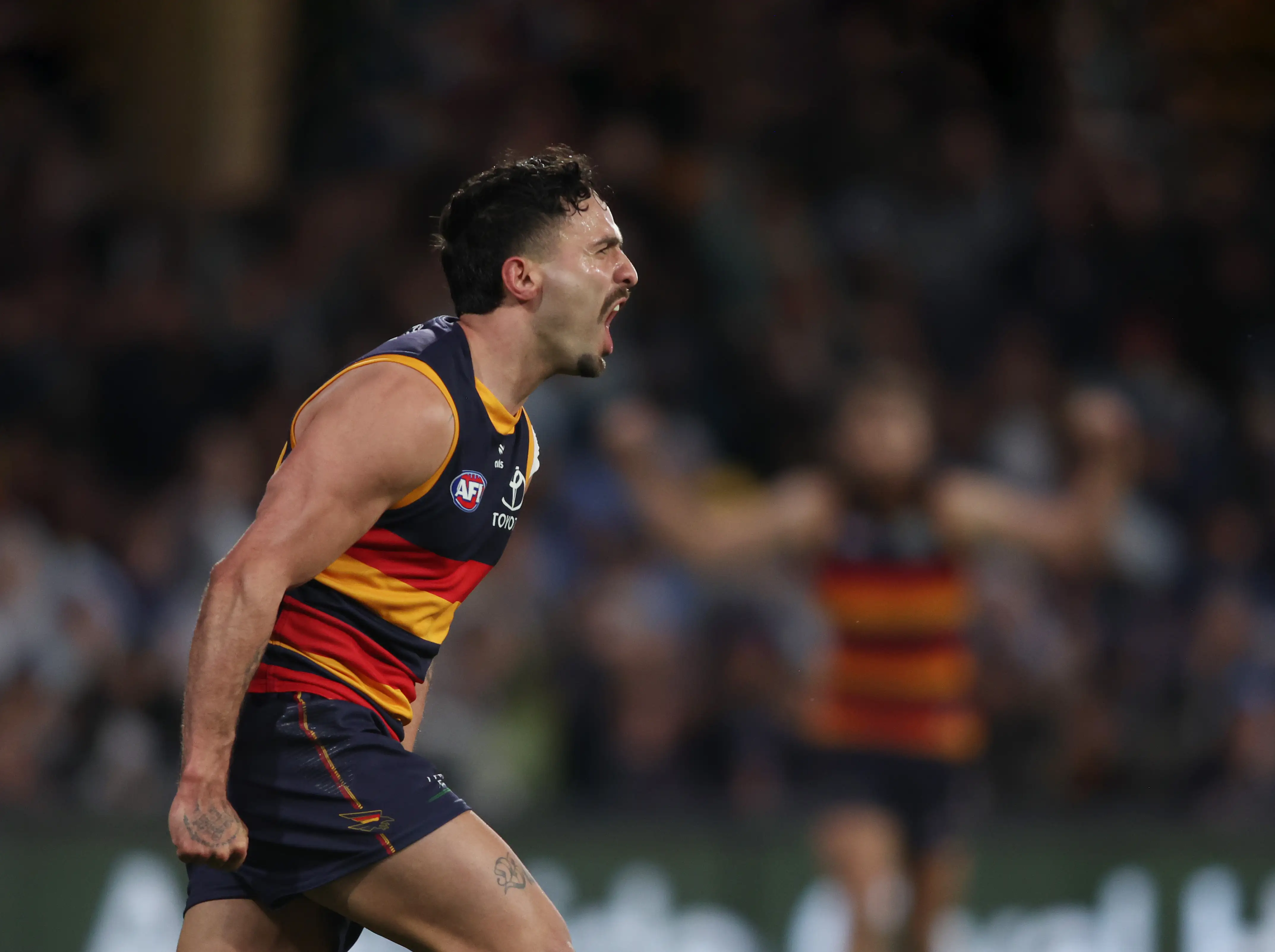 Izak Rankine of the Crows celebrates during the round 23 AFL match between Adelaide Crows and Collingwood Magpies at Adelaide Oval on August 16