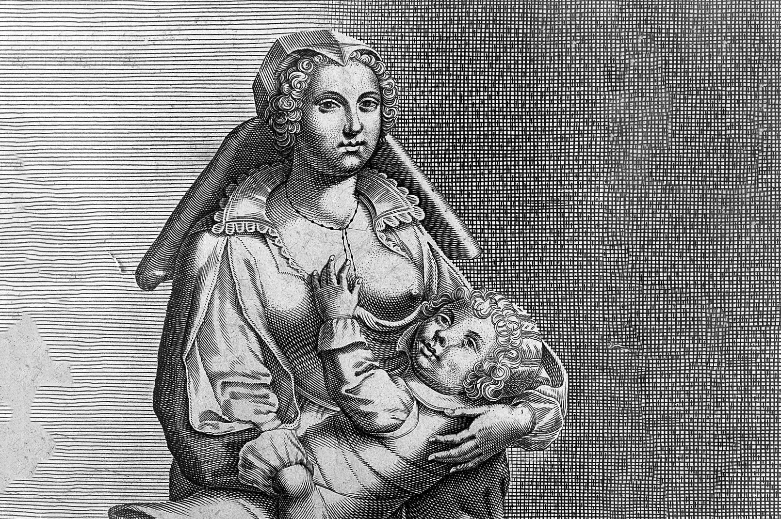 A 17th Century engraving of a woman breastfeeding her child.