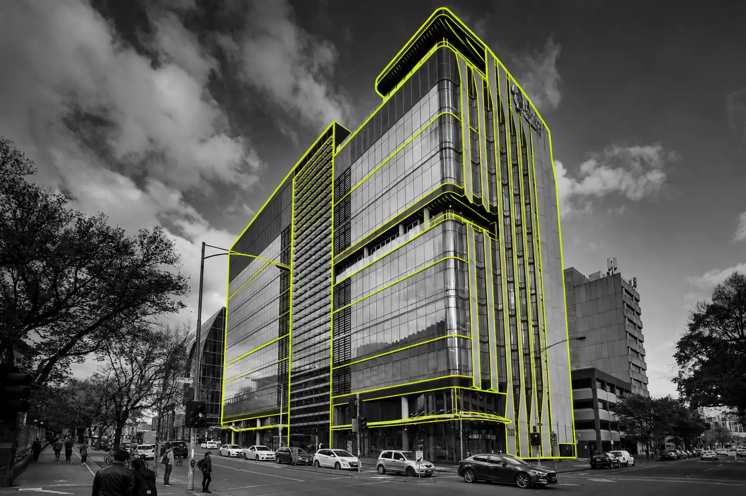 A black-and-white photo of the Doherty Institute with elements picked out in lime green