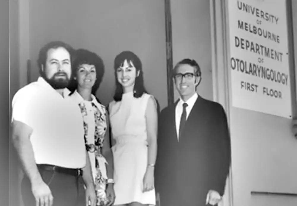 Professor Graeme Clark with a model of an ear