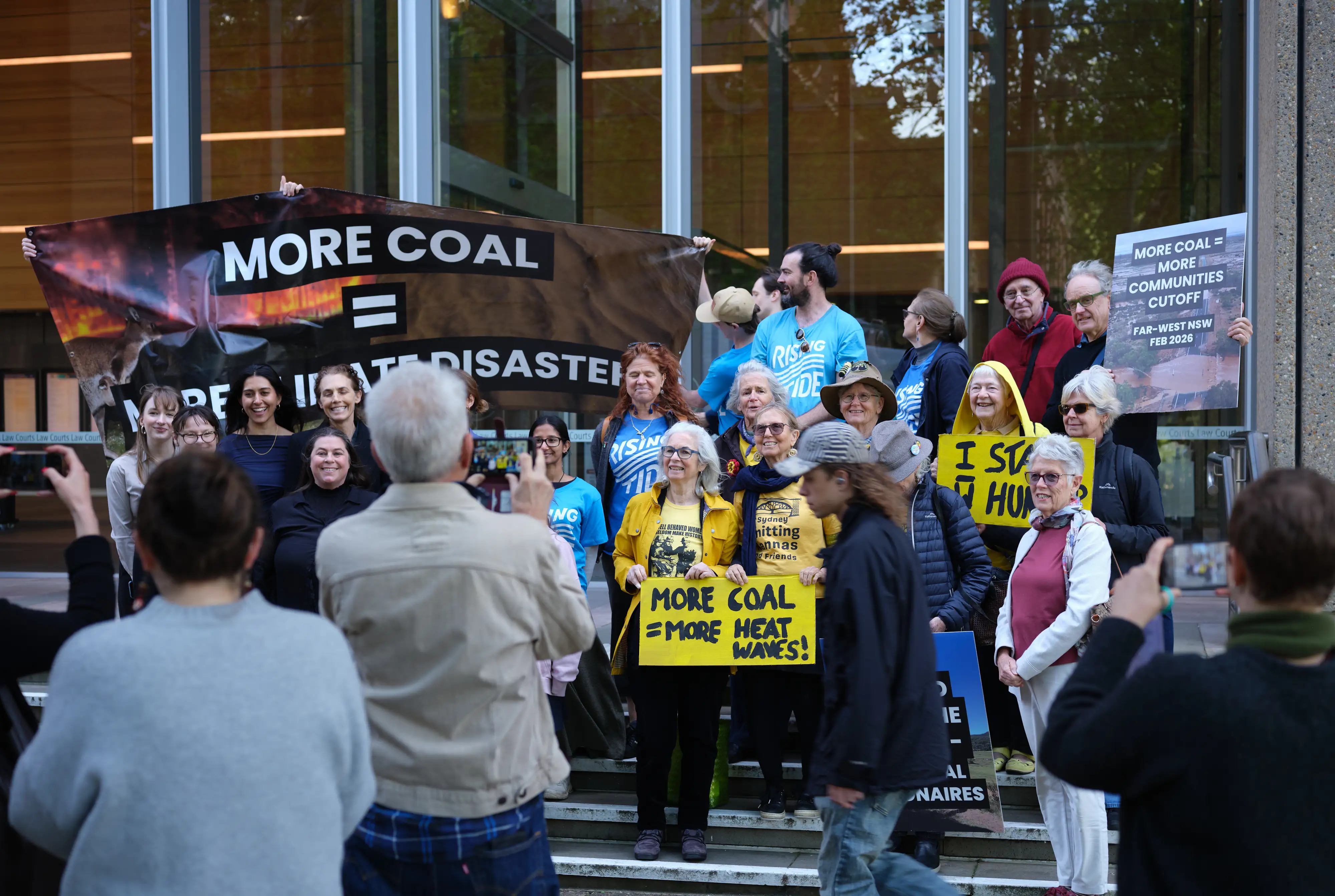 Activists and supporters from the Denman Aberdeen Muswellbrook Scone Healthy Environment Group outside the High Court