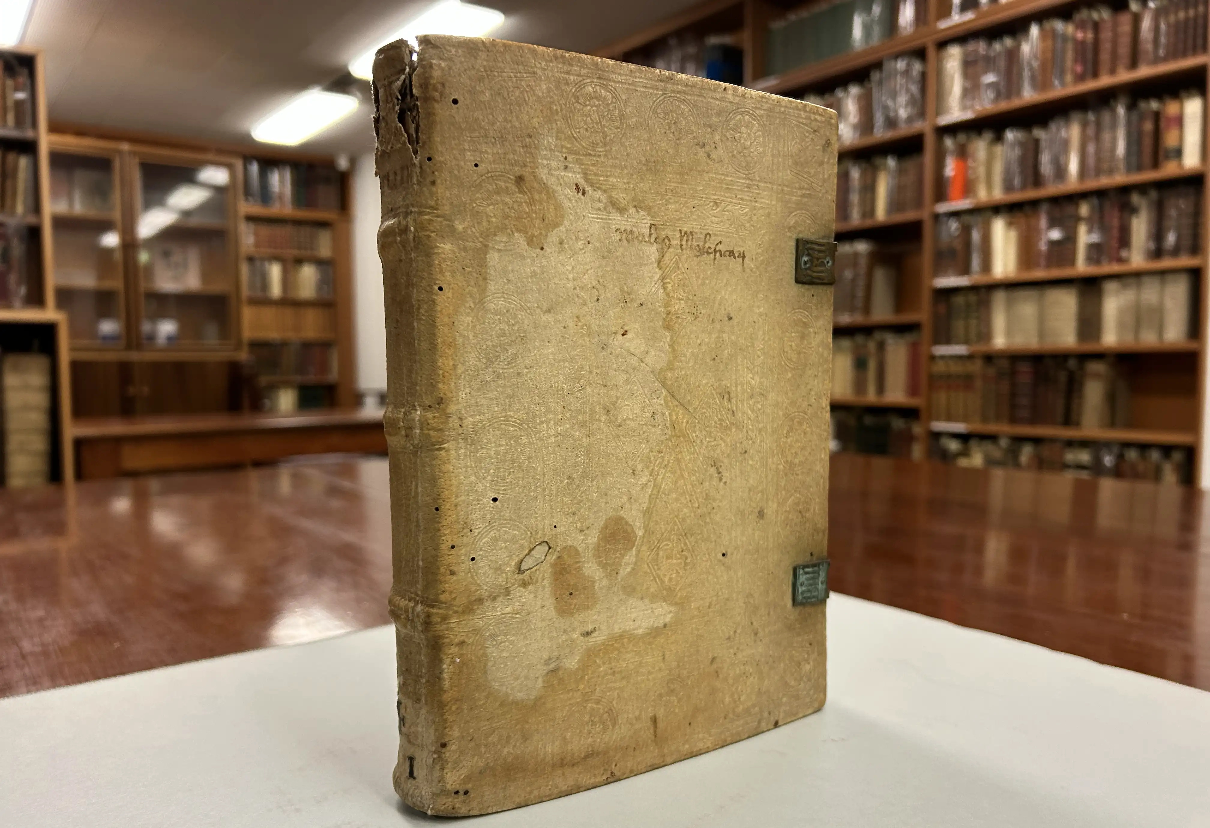 The Malleus Maleficarum or Hammer of Witches displayed in a library