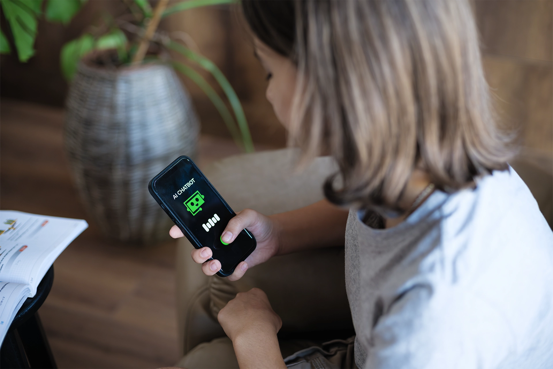 A girl interacting with a chatbot on her phone
