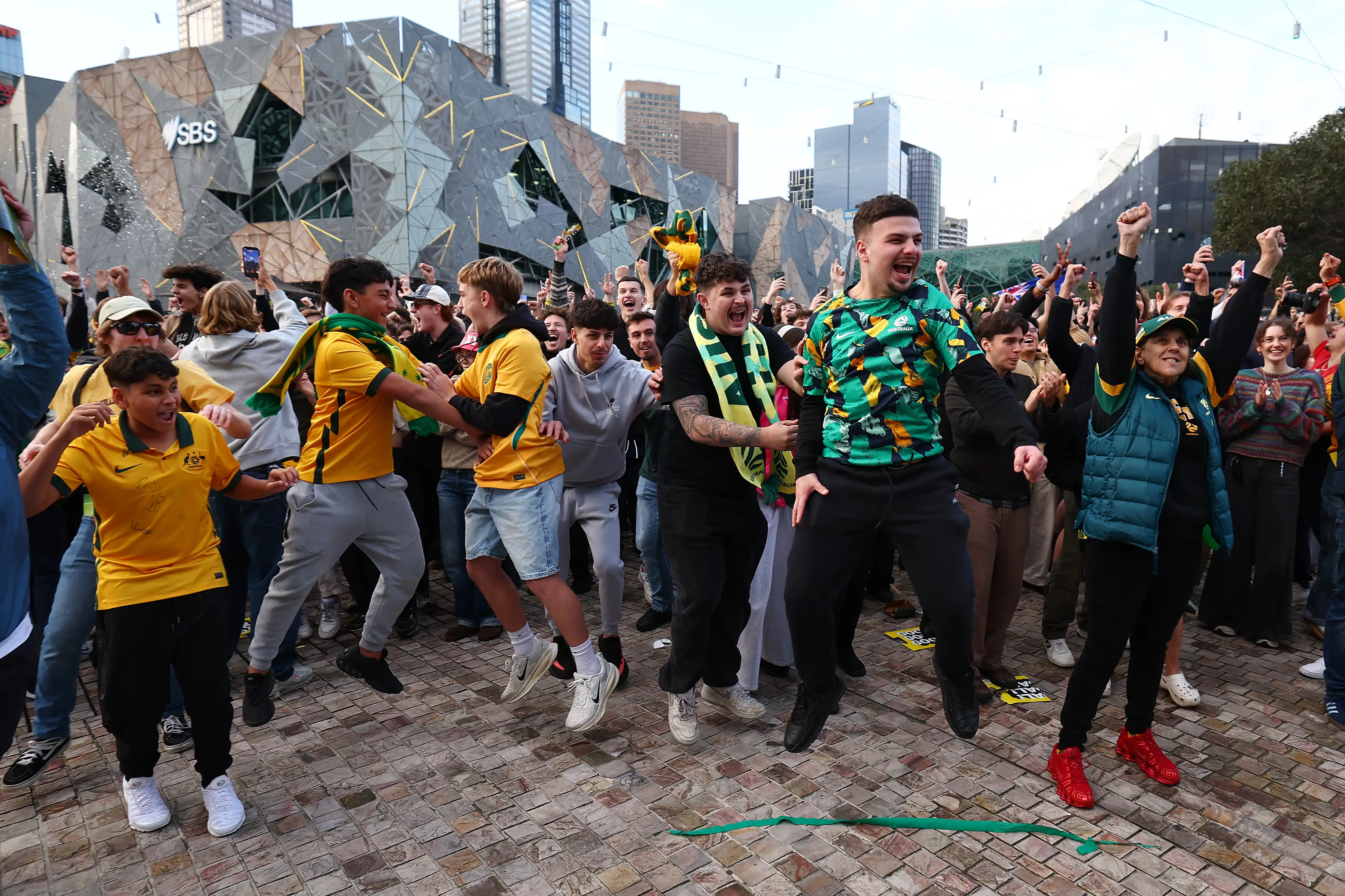 Australian fans celebrate in Melbourne’s Federation Square 
