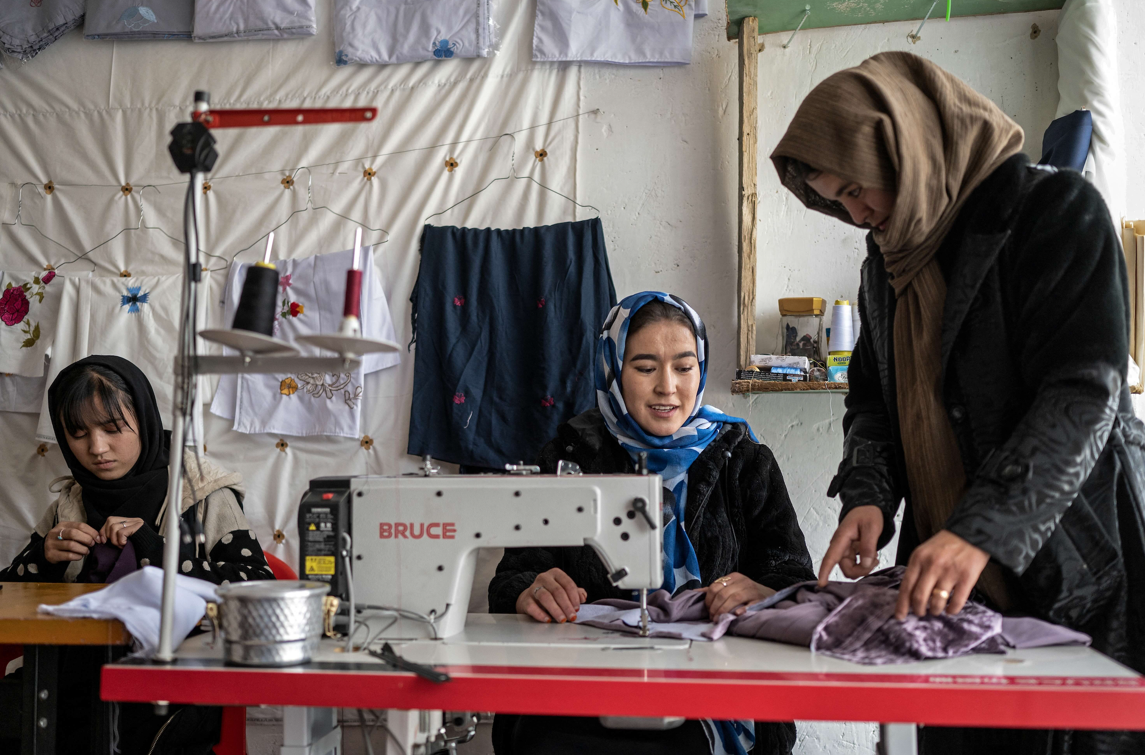 Afghan women working in a clothing shop