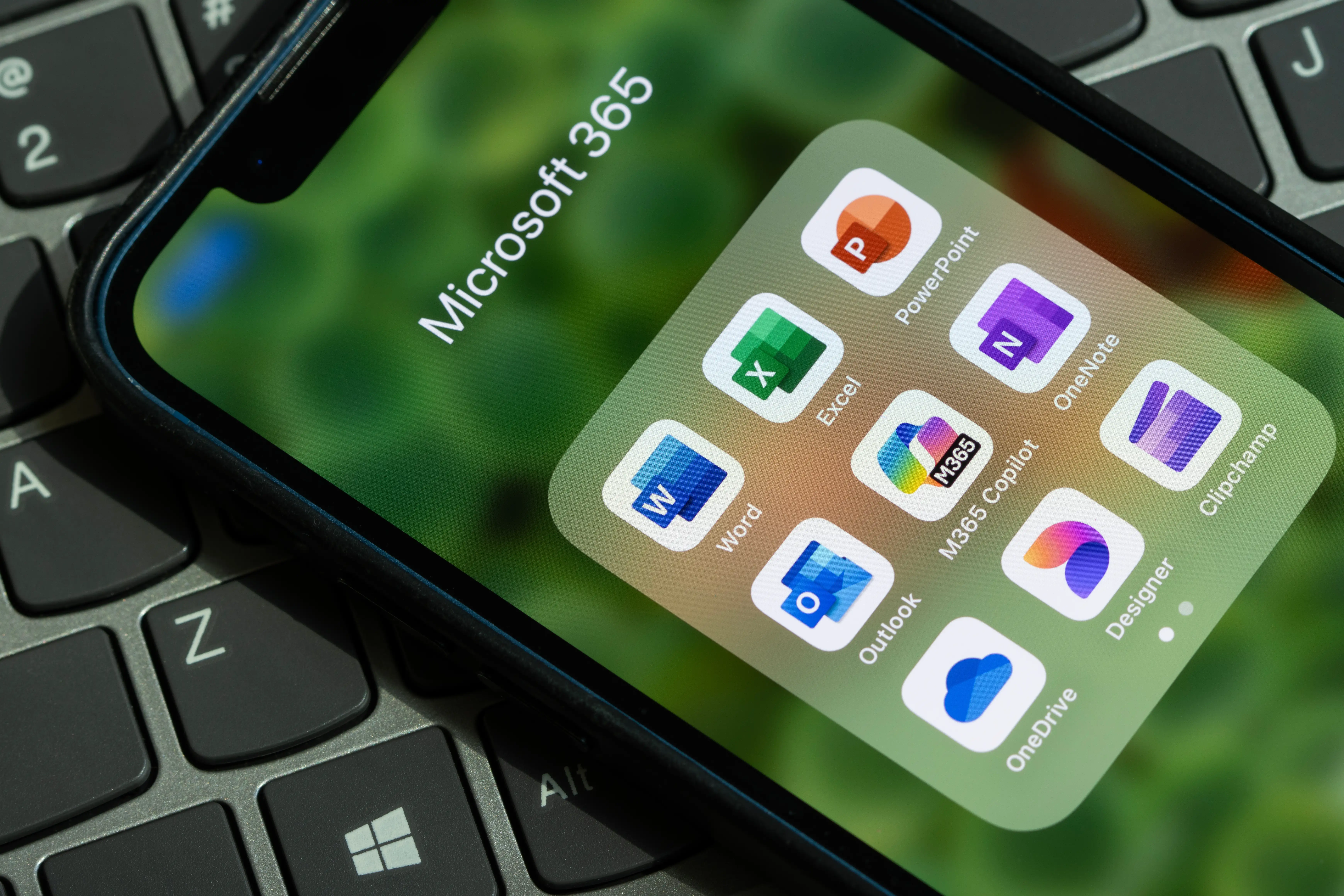Assorted Microsoft 365 apps including Word, Excel, PowerPoint, Outlook and Copilot on an iPhone