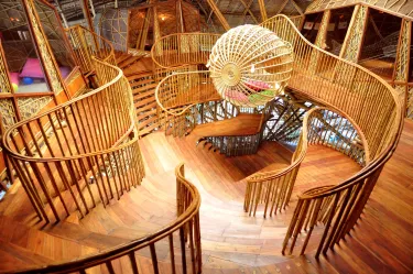 Inside The Den with lots of curved timber and bamboo